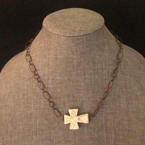 Horizontal cross/copper chain necklace-21”. Cream colored cross w/brown veining.